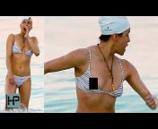 sddefault.jpg from michelle rodriguez has wardrobe malfunction while on the beach with mystery woman 13