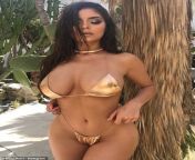 17475498 7374741 she s back demi rose posed against a palm tree in a barely there m 8 1566293768942.jpg from demi rose nude fake