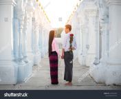 stock photo the young lover myanmar in dressed traditional get surprise big red roses for girlfriend on 1301852269.jpg from myanmar young sex couple