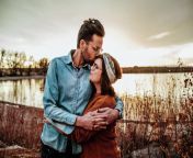 hip husband kissing smiling wife near a lake in colorado cavan images.jpg from husband romance hip kiss