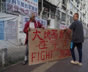 free photo of two men holding a sign that says fight for justice jpegautocompresscstinysrgbdpr1w500 from 世界黄色直播平台iz262 com coz