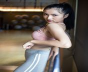 woman standing relaxed hands placed steel rail gym 1150 16535.jpg from chainij sexcy