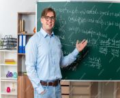 young male teacher wearing glasses happy positive explaining lesson standing near blackboard with mathematical formulas classroom 141793 99035 jpgw2000 from teÃ cher