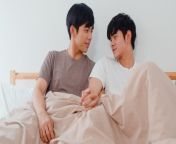 handsome asian gay couple talking bed home young asian lgbtq guy happy relax rest together spend romantic time after wake up bedroom modern house morning 7861 1965.jpg from asian gay pg