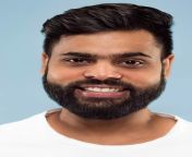close up portrait young indian man with beard white shirt isolated standing smiling 155003 23823.jpg from indian mans