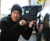 male asian thief steals car breaks door lock with mechanical screwdriver tool 321831 10886.jpg from japanese burglar