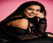 portrait smiling young woman against pink background 1048944 16495296.jpg from indian sxy