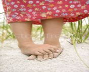 8454 stock photo little girls feet in the sand.jpg from little sand crusted feet