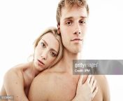 studio portrait of bare chested young couple staring jpgs612x612wgik20crywm5j9q03 0eyvyt8ey7enk5jauh7m0zaqsrbeupxs from young nude couple