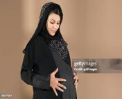 pregnant woman touching abdomen smiling jpgs612x612wgik20cjizaf4grfwkgwbpxxrmlcykfzvupep5xpucqeso34f4 from arab pregnant mom want sexsi school 17 yers hir