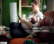 mother breastfeeding baby sitting in real living room with smartphone jpgs612x612wgik20cxy6ewg kq3qrx2tbponi9v1lvelmd1qiyzemfhulyey from real russian mom small son pg se mousumi nude sex com xxx
