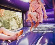 young girl bounces on a purple bouncy castle jpgs612x612wgik20cbymypojujogavh6e5cszmasyys8d25f1ckpyr9ccre8 from bounces on