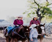 two young cowgirls on their horses and their older sister accompanies them on foot jpgs612x612w0k20cskyn6zzbhajmndpef51 6pzkfa rr26lo6n7t y2rm from real riding sister