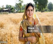 happy woman standing in agricultural field jpgs170667awisk20c4adzlkr cfxf9klv508zijou6kqe4tfejejciyalmzm from desi village bhabhi selfie