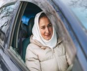 beautiful smiling young muslim woman in headscarf in light clothing in right hand drive car t20 yn9yx9.jpg from thipse sex photos