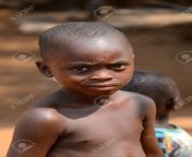 105641697 pira benin jan 12 2017 unidentified beninese little boy with beautiful eyes frowns benin.jpg from benin vano baby azetogbèdé de benin