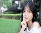 79877688 cute asian girl teenage model in park background.jpg from asian cut gril