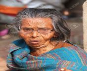 19349905 very old woman on the street in blue dress.jpg from old wuman