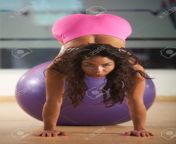 67921087 woman workout with fitness ball in gym in good shape pretty hispanic training her body.jpg from hot gym ball excercise