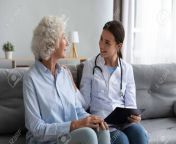 133881750 caring young woman nurse help old granny during homecare medical visit female caretaker doctor talk.jpg from granny and home nurse