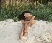114598231 lonely beautiful woman on the nudist beach lady with perfect body sitting on sand gorgeous mixed.jpg from nudist mix