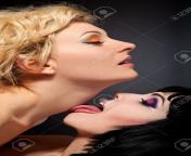 13871080 two young attractive lesbians kissing isolated on gray background.jpg from lesbian neck licking
