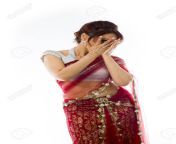 33761886 shy young indian woman peeking through covered face.jpg from shy indian