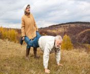 68257821 elderly couple having fun and playing the wheelbarrow in nature woman carried his husband until old.jpg from mature couple having fun with their 18yo roommate guy from mature