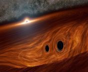 supermassive black hole surrounded by two black holes.jpg from natusamare’s slack holes