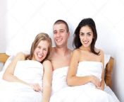 depositphotos 18010643 stock photo a man with two hot.jpg from 2girl and 1boy do sex