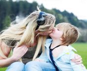 mother son outdoors kissing photo.jpg from american mom son kiss