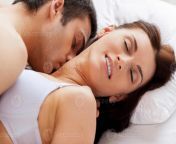 i love him kissing me beautiful young loving couple having sex while lying in bed photo.jpg from cupl sex