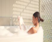 woman relaxing in a bubble bath free video.jpg from bathing video