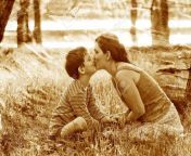 19484050 retro sepia photo mom son of woman and child sitting on gra stock photo jpgw1300 from mom and son love story 3g