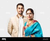 indian asian old mother and adult son in traditional wear standing isolated over white background 2cebdgk.jpg from indian mom aunty and son se
