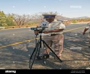 traffic policeman with speed camera on highway outskirts of nelspruit mpumalanga south africa 2a2afec.jpg from south african cam