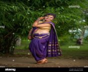 indian beautiful young girl in traditional saree posing outdoors 2c7p55w.jpg from indian marathi saree aunty outdoor bathing