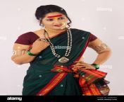 indian model wearing maharashtrian sari jewelry and nose ring 2d6bhw4.jpg from marathi kamwali