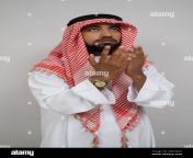 an arabic muslim turban prays with both hands raised up 2g5hg2t.jpg from both arab
