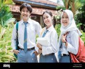 close up of a male indonesian high school student and two female high school students wearing a school bag and smiling with the camera 2f2jkyk.jpg from piplan‏ ‏high school no 1 sex downlod