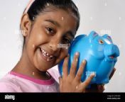 mumbai maharashtra india asia may 05 2008 indian cute little girl holding piggy bank money saving concept 2hnye6p.jpg from desi cute showing her save pussy selfie video