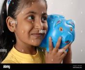 mumbai maharashtra india asia may 05 2008 indian cute little girl holding piggy bank money saving concept 2hnyg78.jpg from desi cute showing her save pussy selfie video