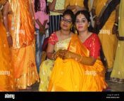 indian hindu bride with turmeric paste applied on her face having fun with her family and friends indian wedding concept 2j48ctr.jpg from indian married auntie enjoying with lover mp4