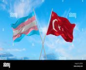 two crossed flags transgender pride and turkey waving in wind at cloudy sky concept of relationship dialog travelling between two countries 3d ill 2j5tdj9.jpg from turkish trans p
