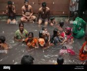 people taking a bath at a hot spring which is believed to have curative qualities inside lakshmi narayan temple complex in rajgir bihar india 2j7tj1f.jpg from hot indan bath