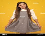 happy girl face positive and smiling emotions 12 13 14 year old girl with dress on yellow background elegant teenager child girl in school summer 2jr0y4k.jpg from school 12 saal ki ladki xxx