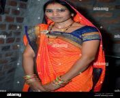indian rural women in traditional clothes beautiful women in orange color saree smiling face 2rfp736.jpg from indian village women saree without blouse nude bathing