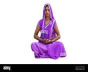 indian village woman in traditional costume doing yoga or meditation on the roof at home 2rhwjw9.jpg from village saree wali desi bhabhi ki chudai xxxian aunty hairy armpit videos