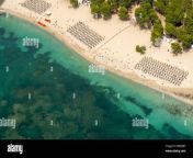 aerial view sunbeds and umbrellas lined up at platja de santa pon 2rwxbbt.jpg from Ãƒâ€Ã‚Â¯up