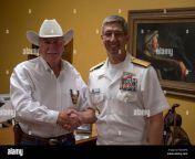 180402 n yr245 0068 waco texas april 2 2018 rear adm jay bynum chief of naval air training and waco native presents a coin to mclennan county sheriff parnell mcnamara in mcnamaras office during waco navy week the navy office of community outreach uses the navy week program to bring navy sailors equipment and displays to approximately 15 american cities each year for a week long schedule of outreach engagements us navy photo by mass communication specialist 2nd class craig z rodartereleased mc5dpg.jpg from www xxx admjay